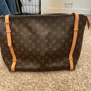 LIKE NEW, AUTHENTIC LOUIS VUITTON
Monogram Canvas Tuileries Bag